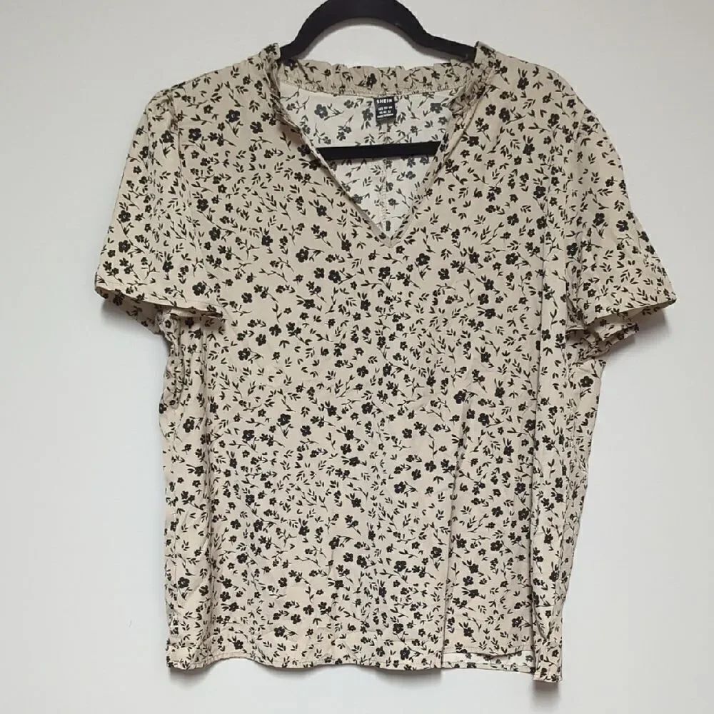SHEIN Cream Relaxed V-Neck Blouse with Floral Print